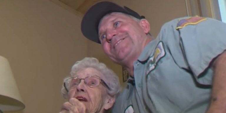 elderly-woman-and-her-garbage-man-who-helped-her-evacuate
