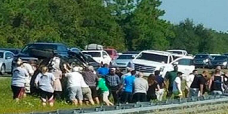 strangers_flip_suv_save_girl_freeway_featured